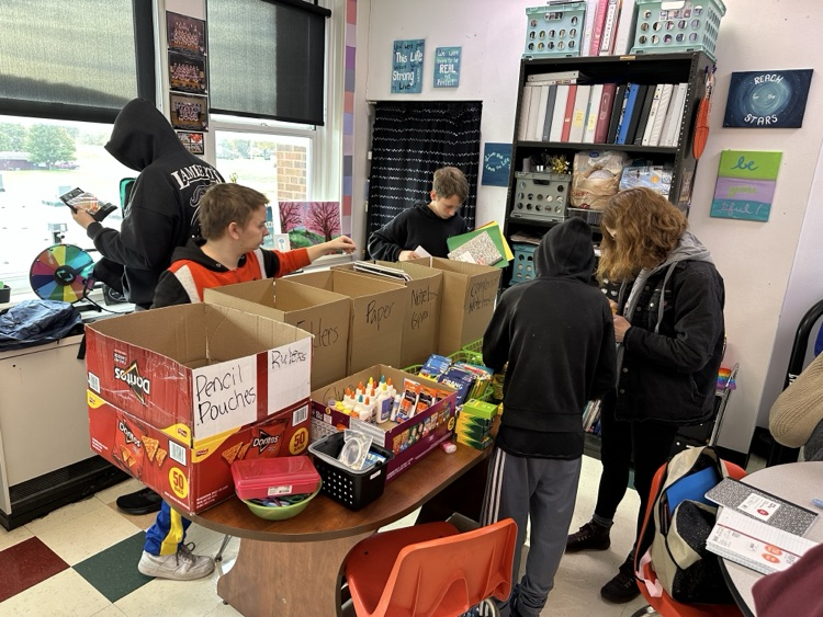 Students Organizing the School Supplies