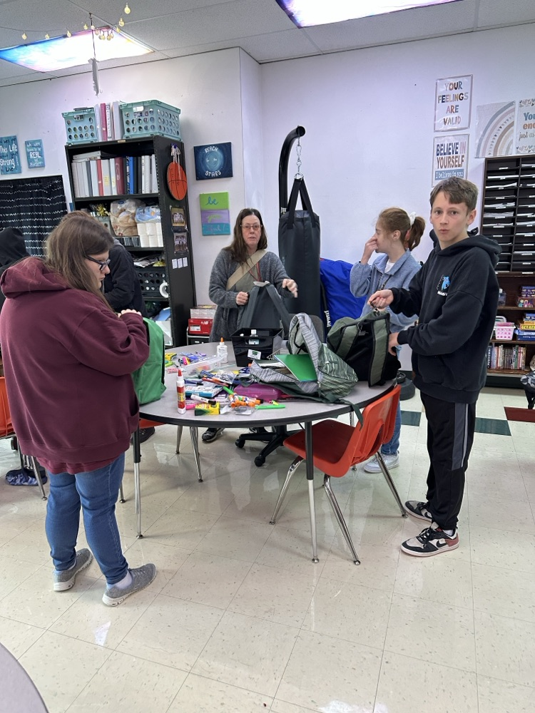 Students Organizing the School Supplies