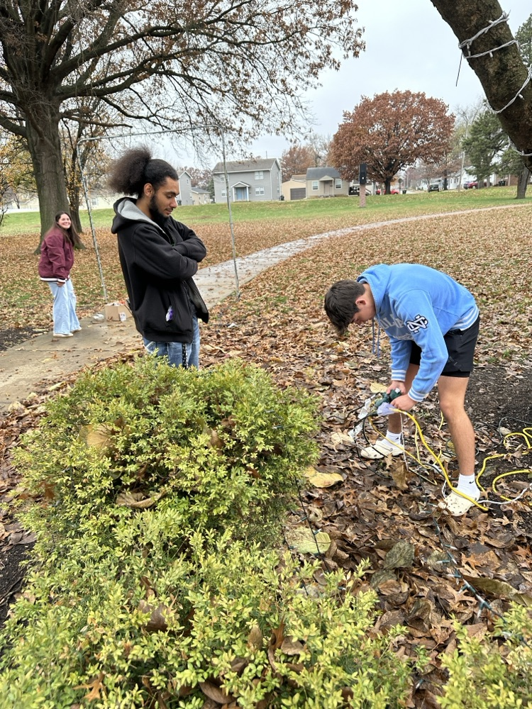 Electrical class bringing Christmas joy and light to our school and community.