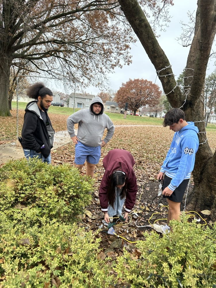Electrical class bringing Christmas joy and light to our school and community.