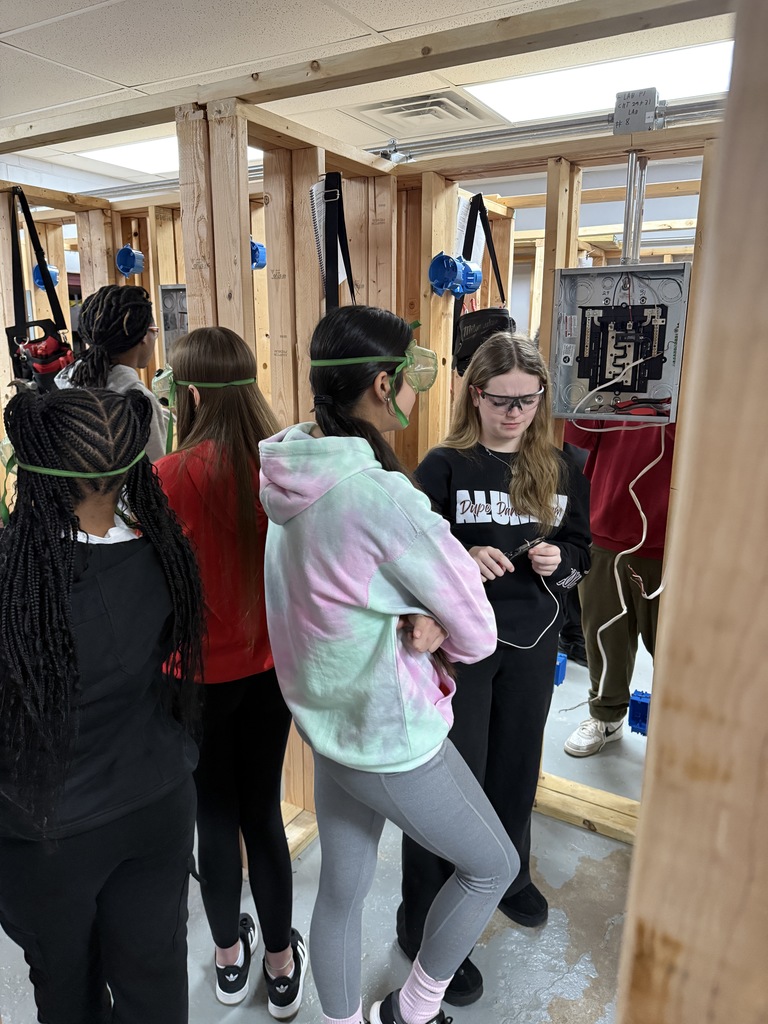 Savannah showing how to strip wire. 