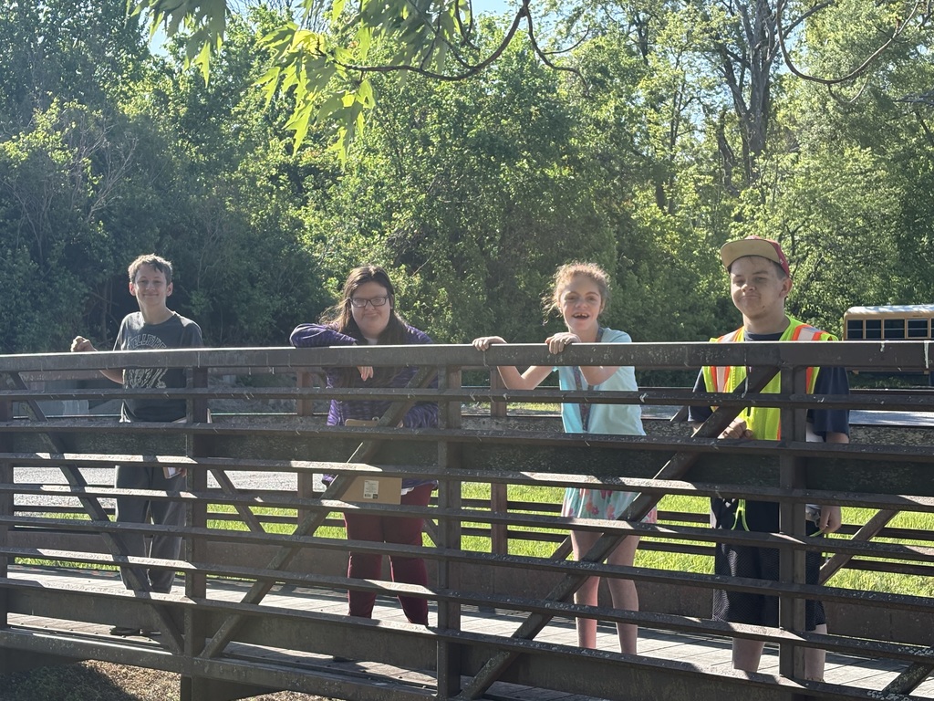 Students outside on a bridge