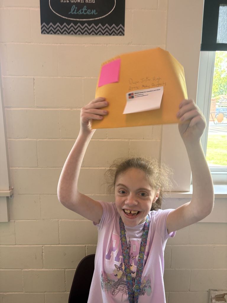 Student holding an envelope!