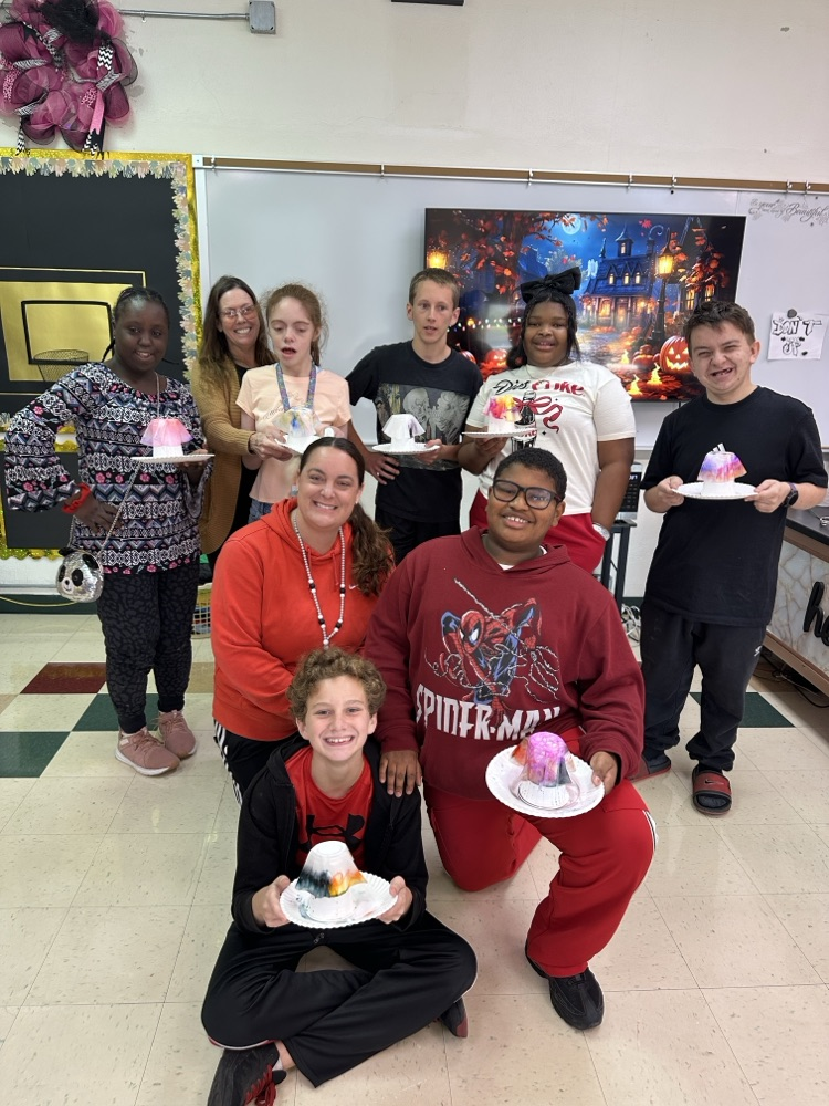 Crafting cute ghosts made from coffee filters, markers, and water