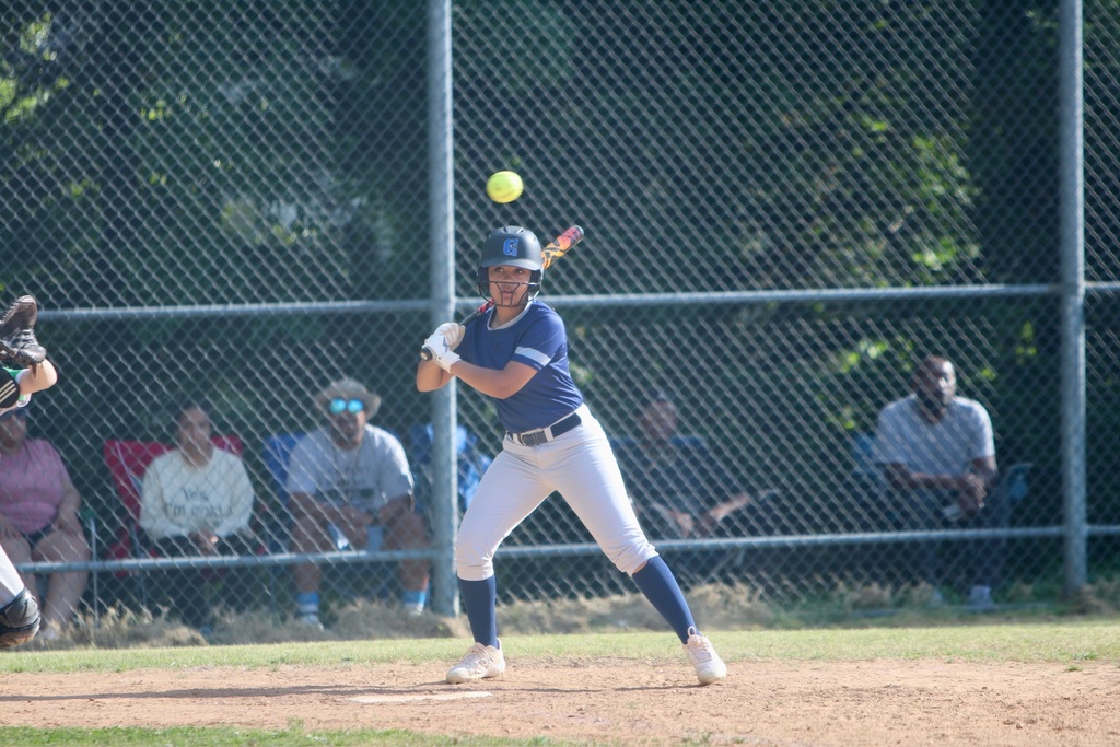 softball player about to take a swing