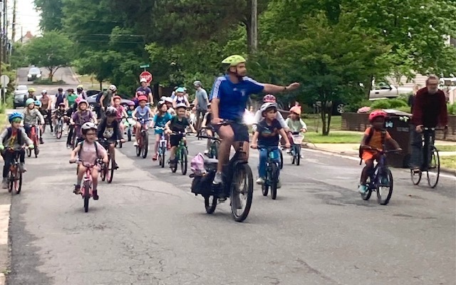 Children and teachers biking to school