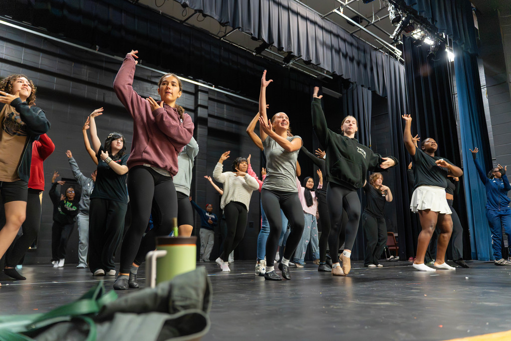 Students dancing on stage