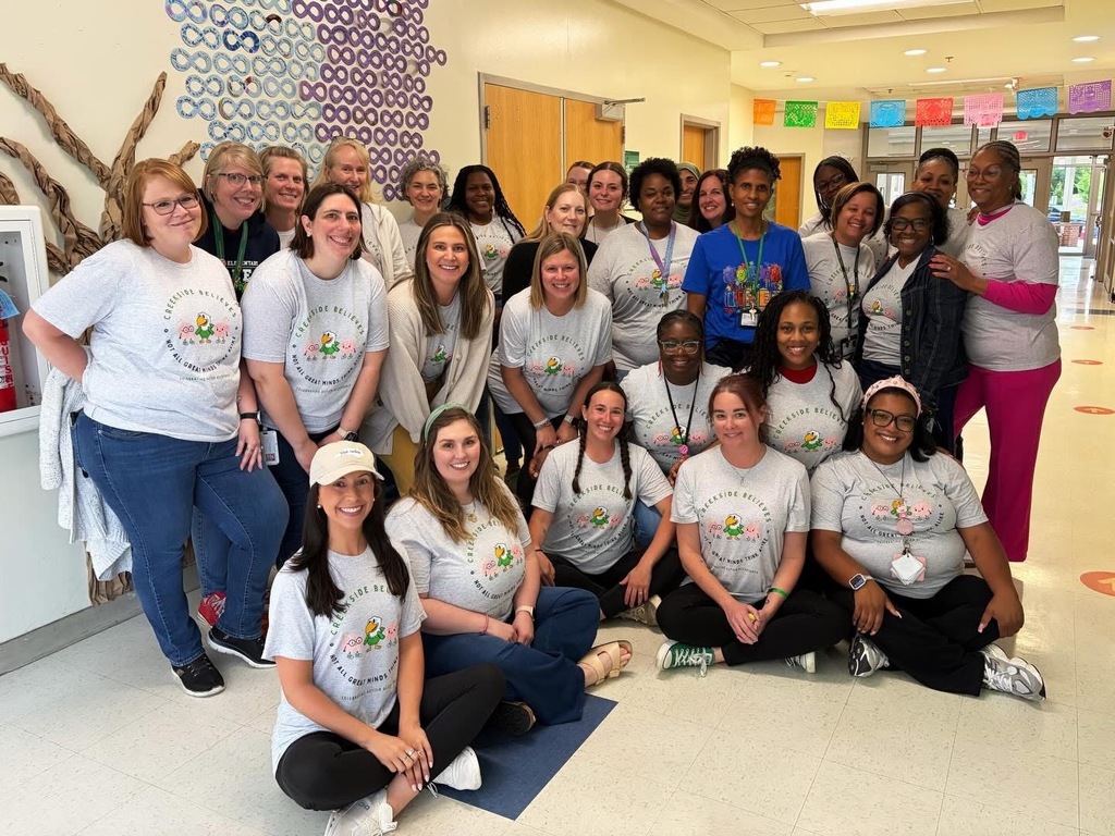 Creekside staff wearing grey shirts about autism acceptance
