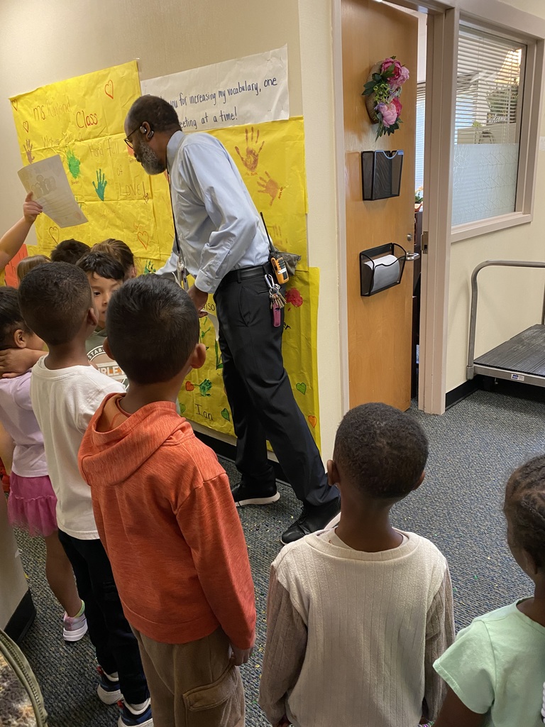 Students thanking Dr. Hogans  on Principal's Day