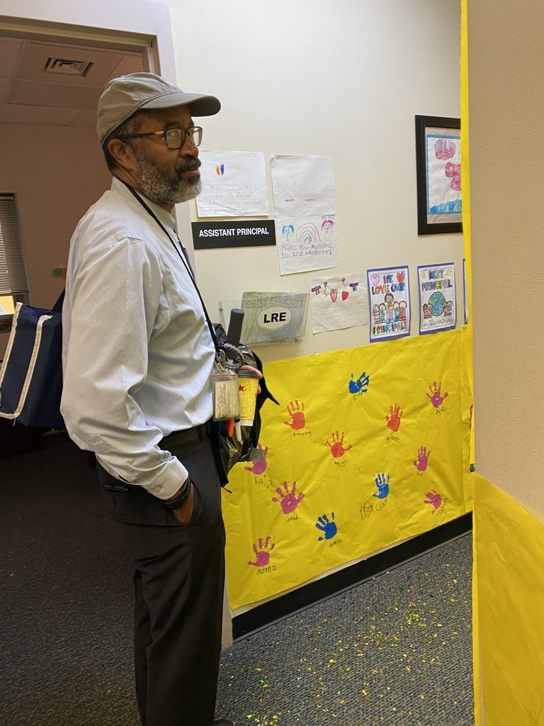 Dr Hogans Looking at art work for Principal Day