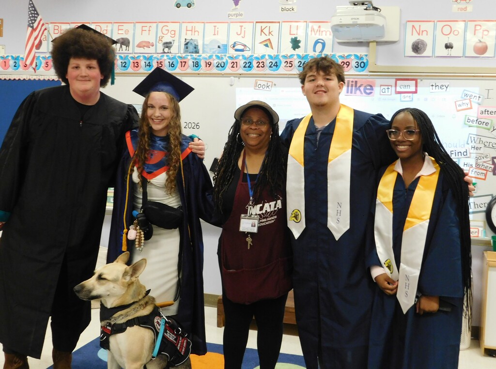 Seniors who are former students with  Ms. Harvey