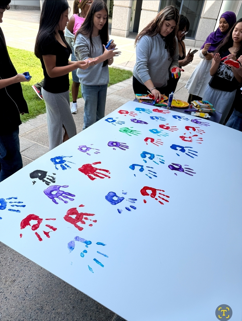 Poster with students handprints