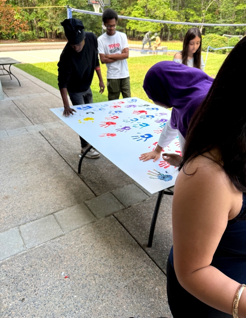 Poster with students handprints