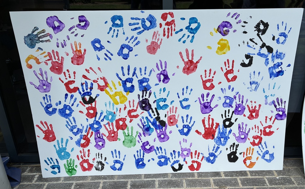 Poster with students hand prints