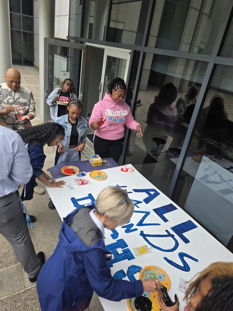 Poster with students handprints