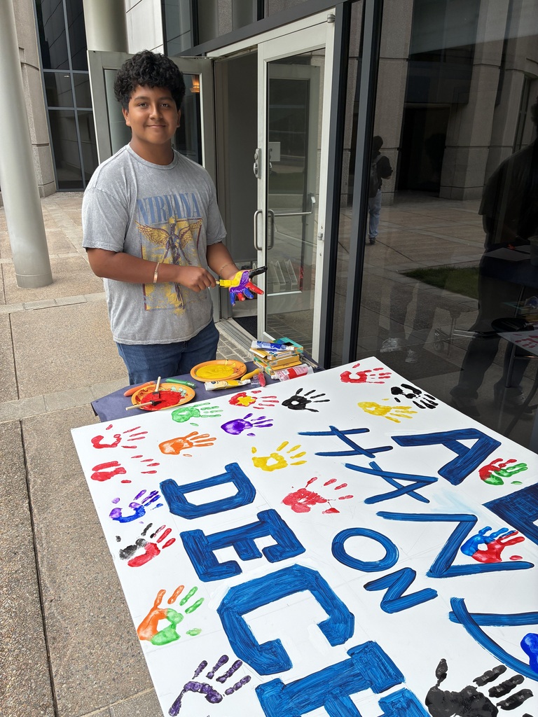 DECHS Student painting his hand