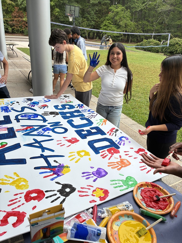 DECHS student painting their hand