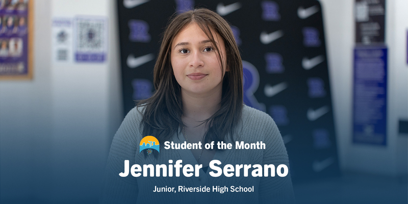 Portrait of a student with long hair, wearing a gray sweater, standing against a blurred background. Text reads: "Student of the Month, Jennifer Serrano, Junior, Riverside High School."