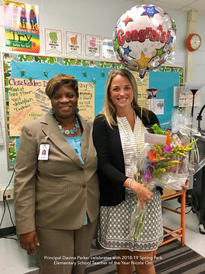 Principal Davina Parker celebrates with Elementary School teacher of the yeas Nicole Orr