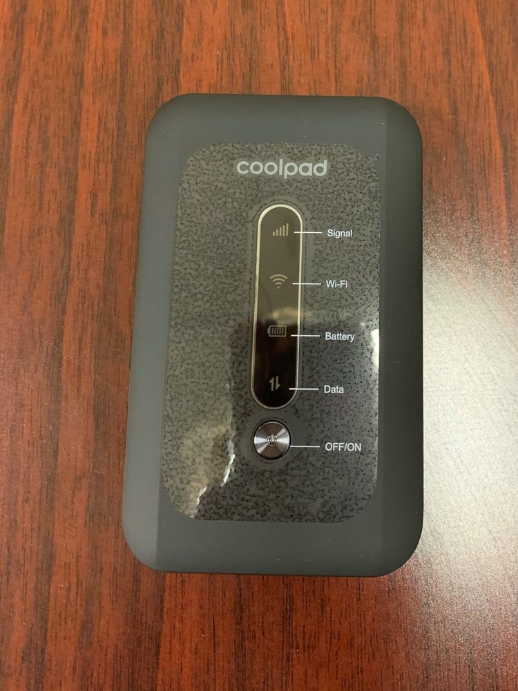 Coolpad, a hotspot device, sitting on desk