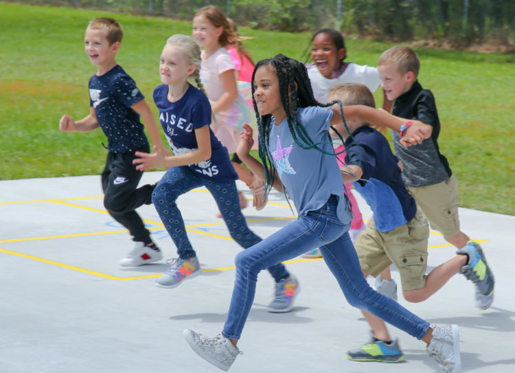 Students running and playing