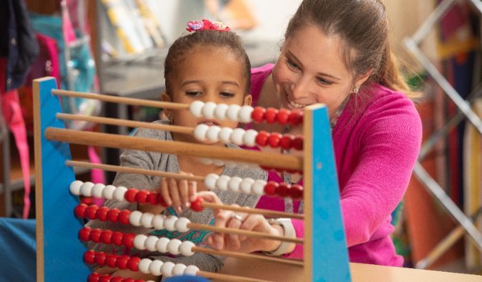 Teacher and student interacting