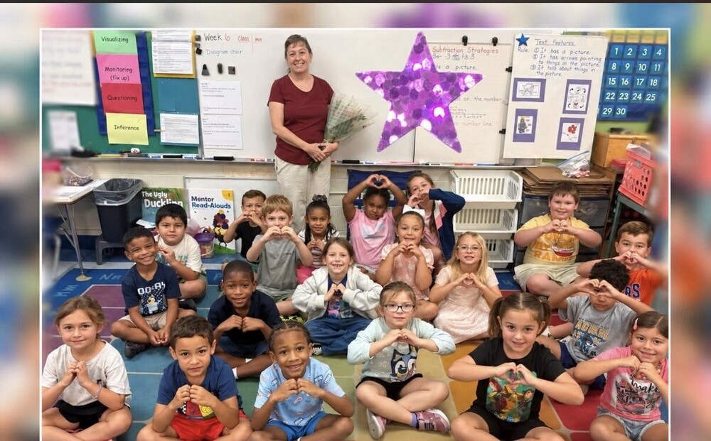 Image of Teresa Gregson, Teachers of the Year, and her 1st Grade Class