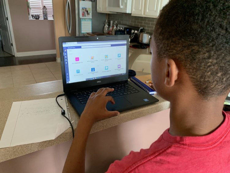 Image of student on laptop