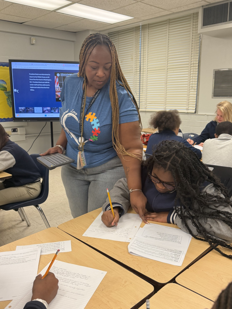 Riabult Middle School civics teacher Monet Baker-Weatherspoon