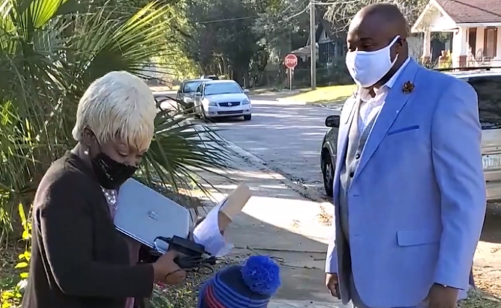 Image of Long Branch Elementary Principal Wayman speaking to a reporter