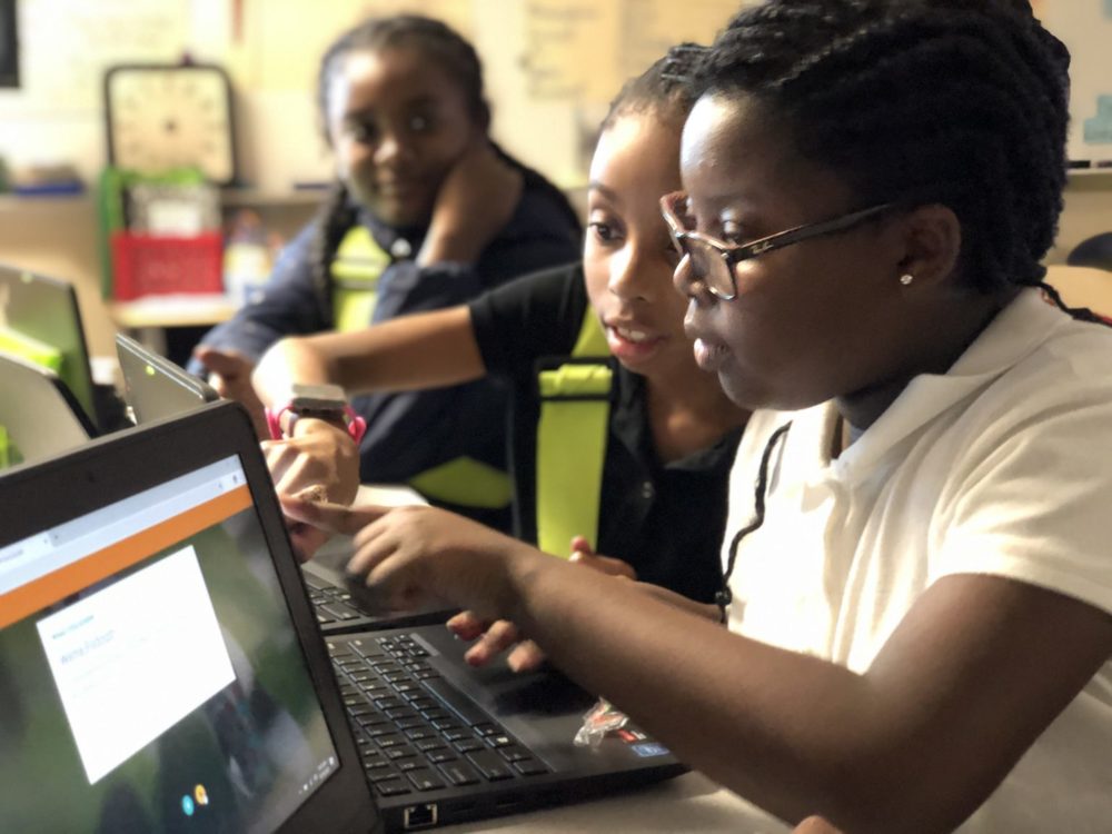 Students studying with laptop