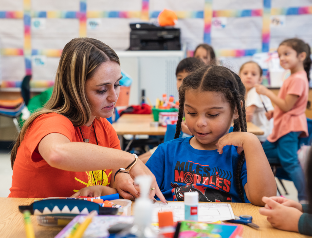 student and teacher in class