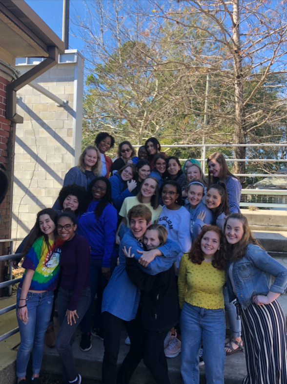 students hugging and smiling