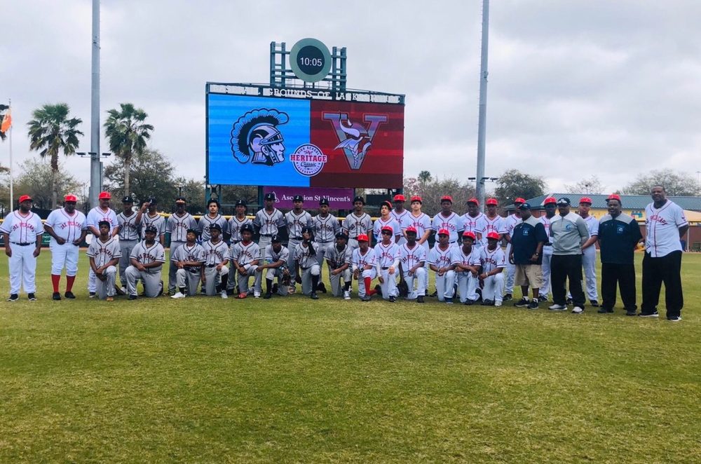 Baseball team taking photo together