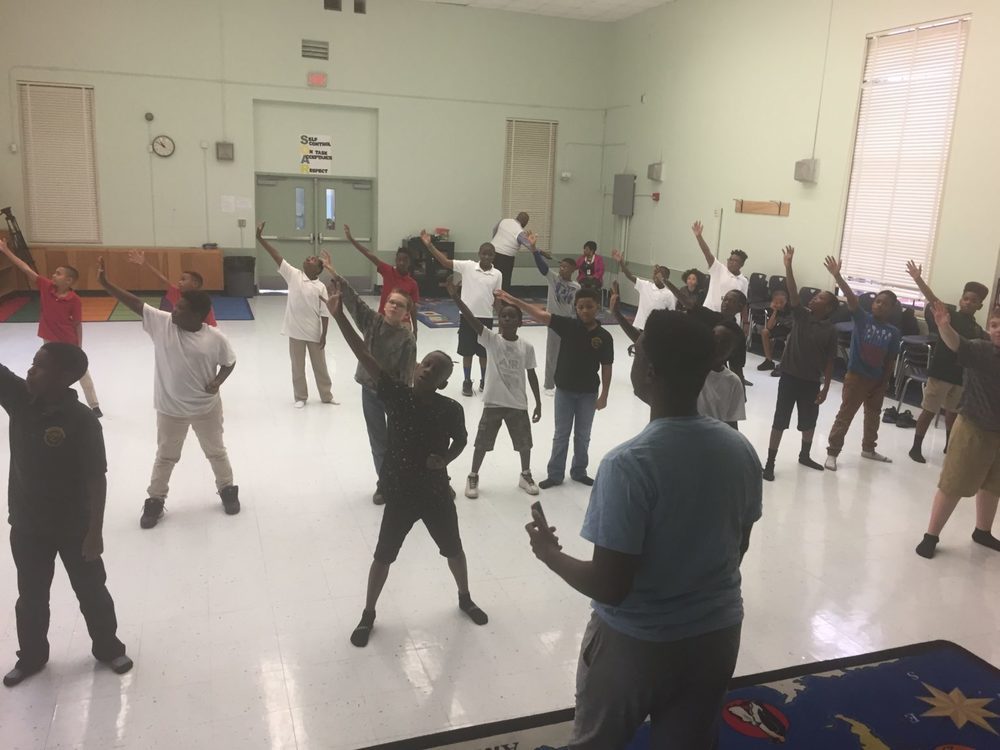 Kids taking a performing class