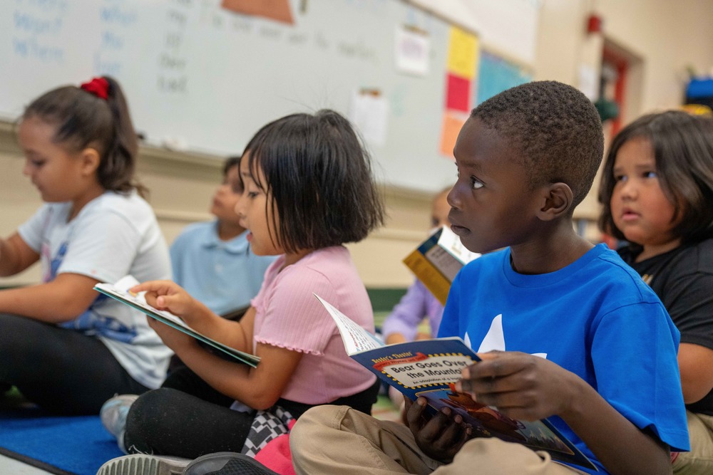 Students read books at Spring Park Elementary's ESOL Summer Program