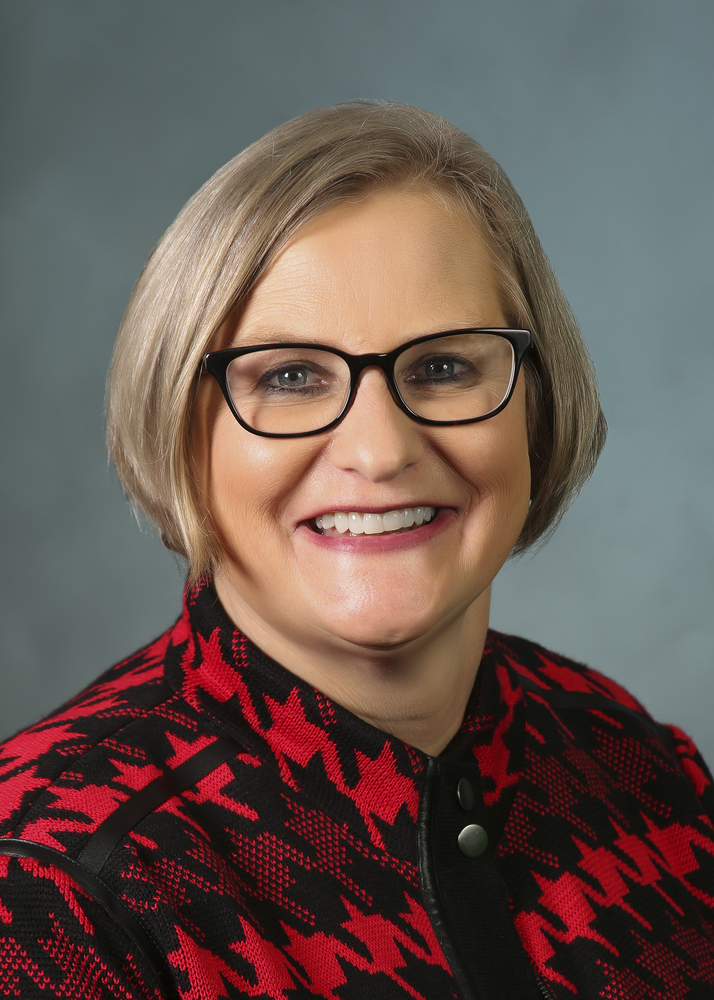 Teacher smiling for photo