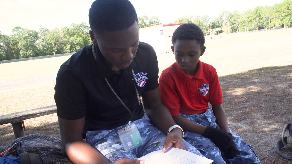 A mentor and mentee at Joseph Stilwell Miltary Academy of Leadership