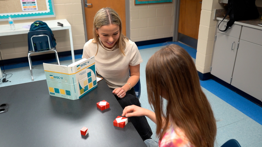 School psychologist works with student