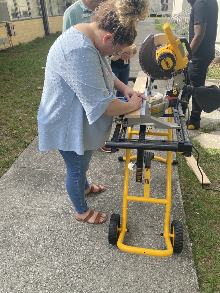 By the end of the day, our teachers will be pros at using a saw!