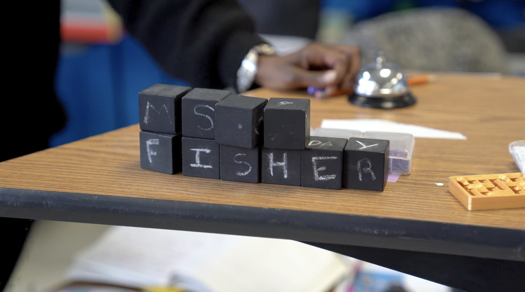 Close-up of a student working on a 3D world in Minecraft, part of a lesson in Fisher’s ICT class.