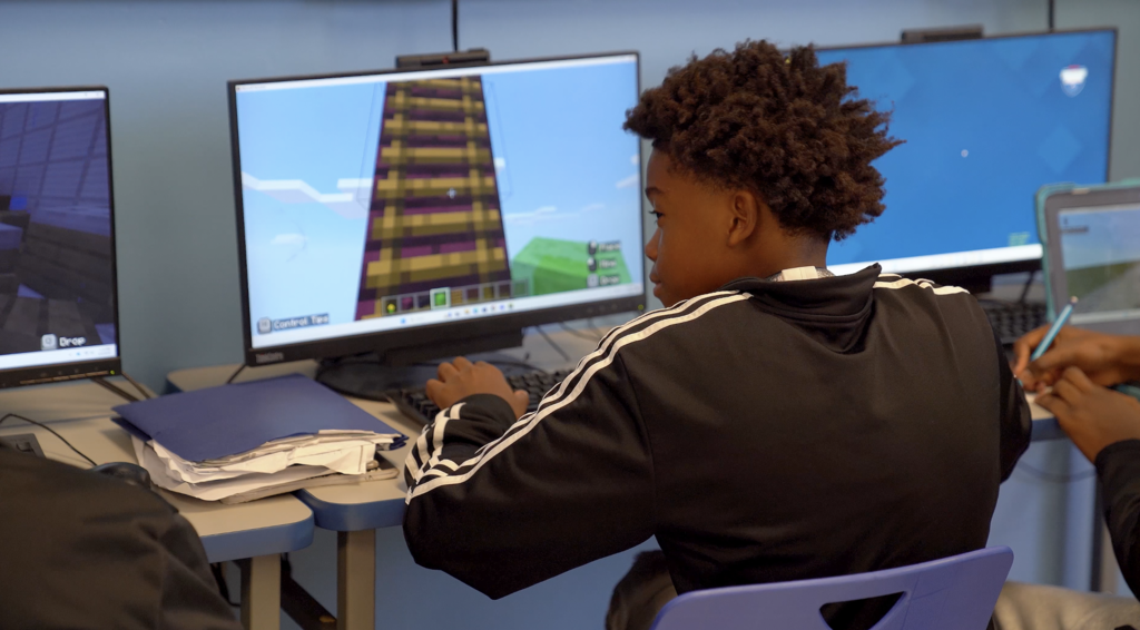 Close-up of a student working on a 3D world in Minecraft, part of a lesson in Fisher’s ICT class.