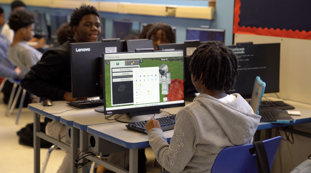 Close-up of a student working on a 3D world in Minecraft, part of a lesson in Fisher’s ICT class.