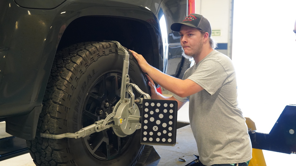 Students working in auto shop