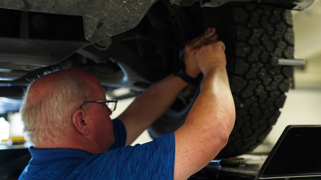 Cory Jeffords working in auto shop