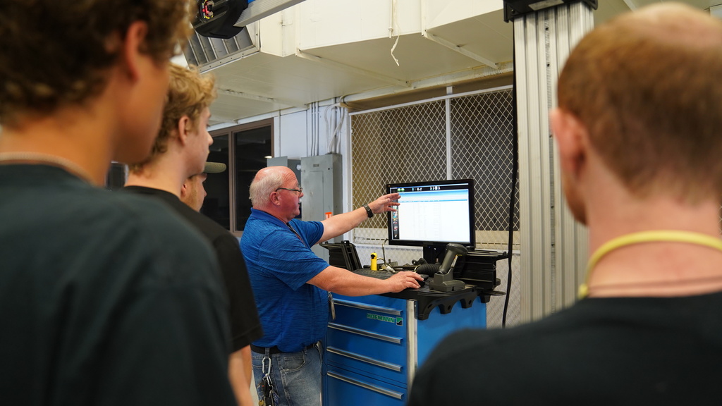 Cory Jeffords working in auto shop