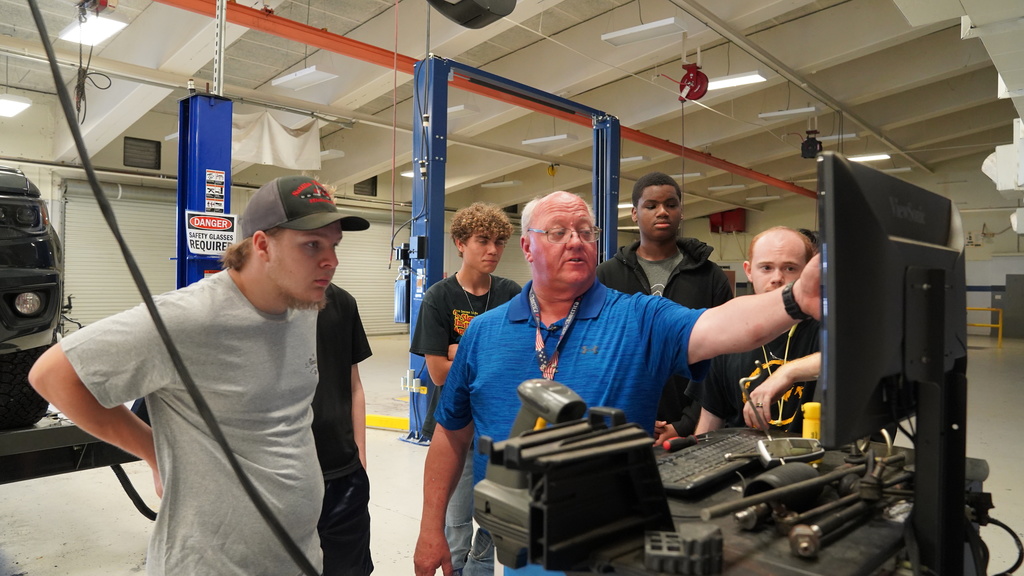 Cory Jeffords working in auto shop
