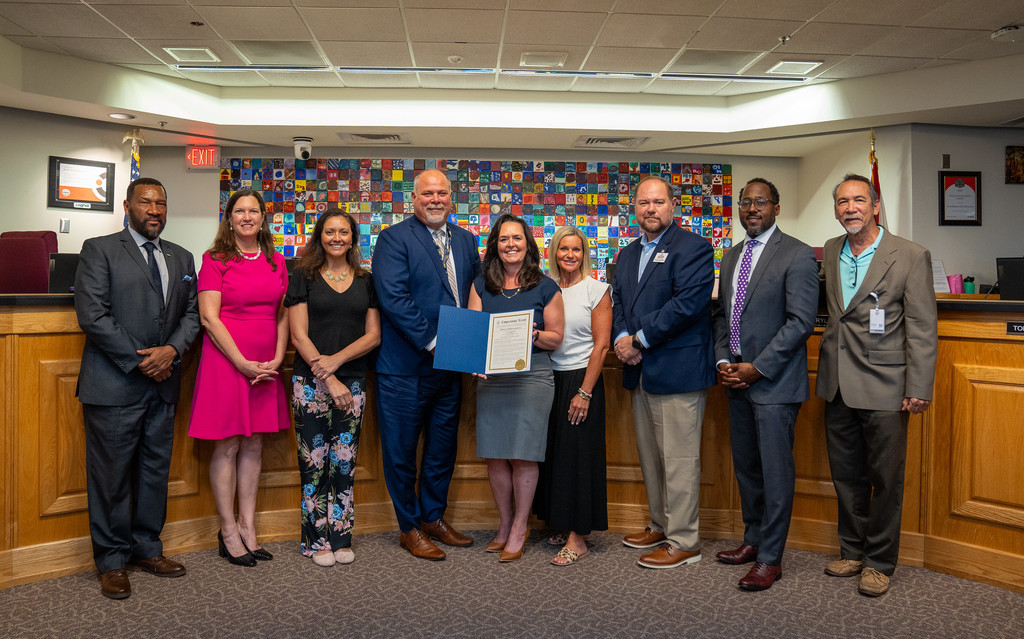 School board presented with copy of official congressional record from US Rep Aaron Bean's office