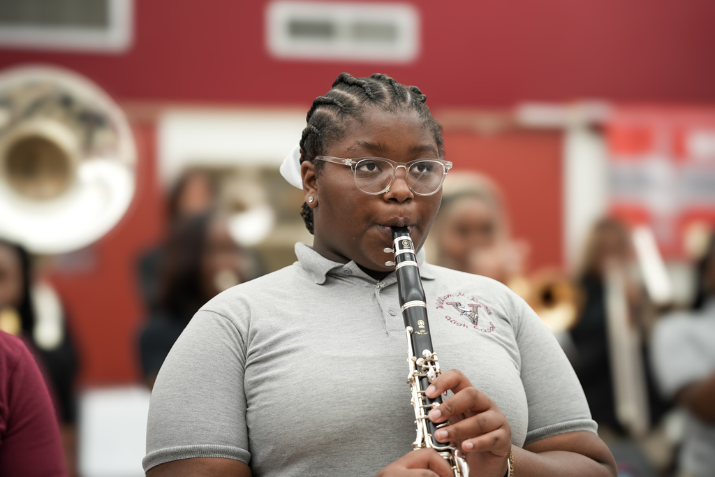 Student Playing in Class