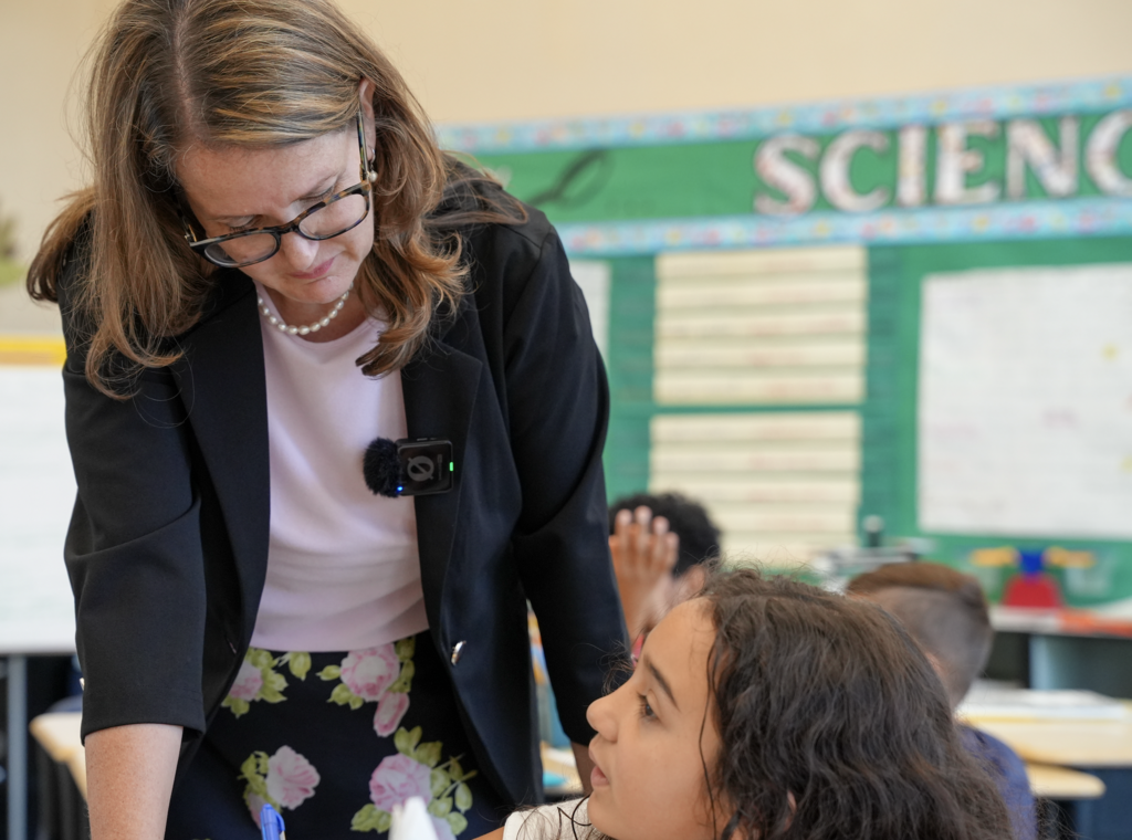 Amber McCormick teaching with a student.